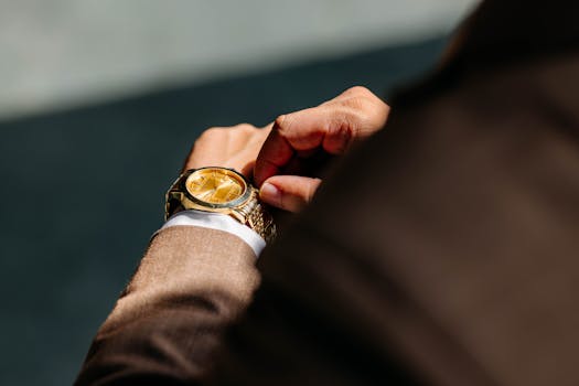 Wrist wearing a luxury watch